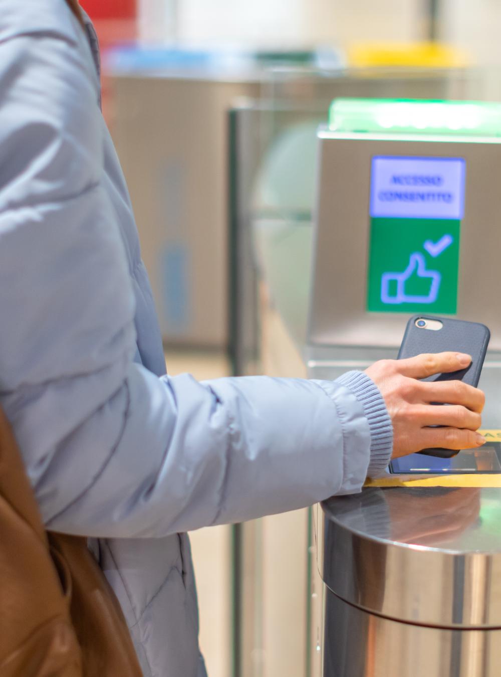 Person scanning a smartphone