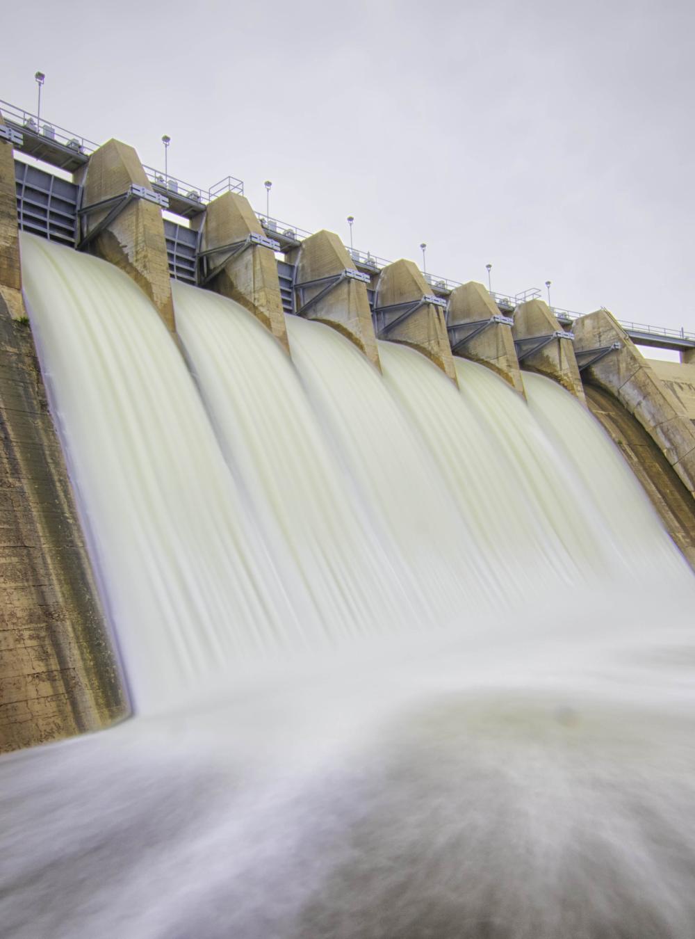Water gushing over a dam that supplies hydroelectric power