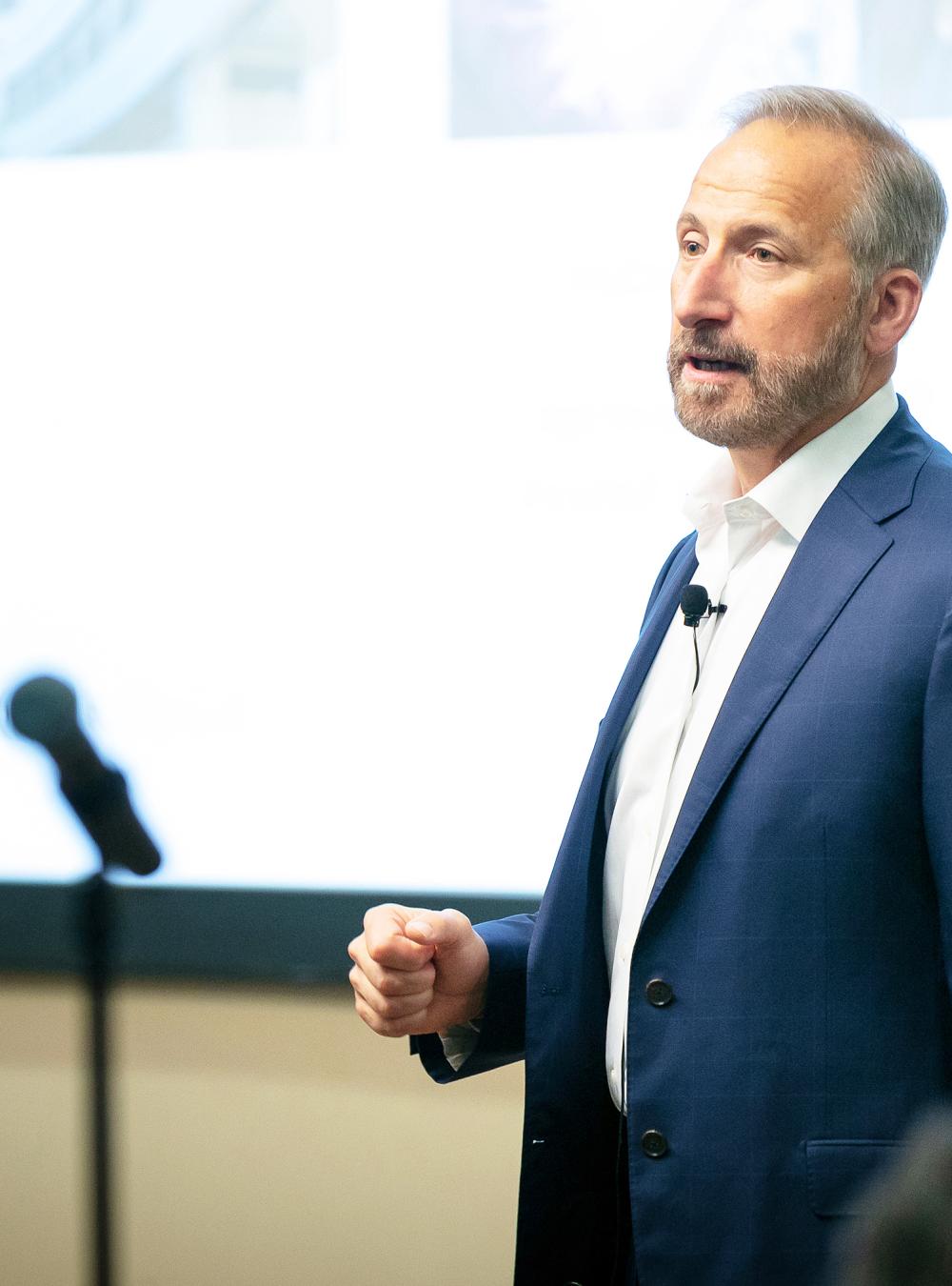 President and CEO Jason Providakes speaking at an all employee meeting