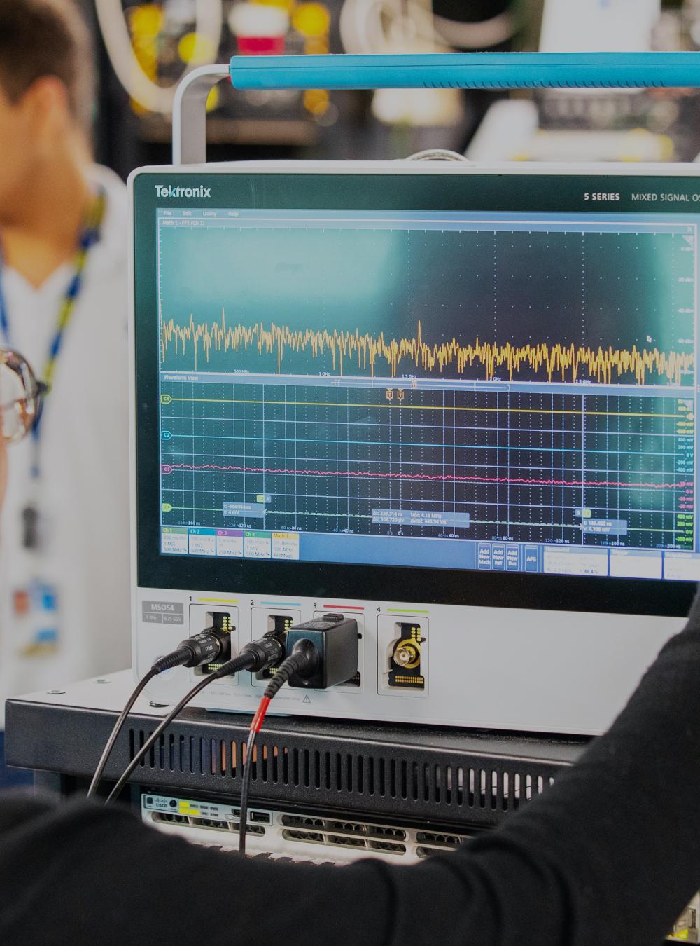 MITRE employee working in the lab