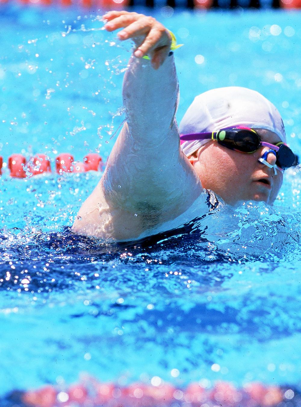 A swimmer in action in a pool