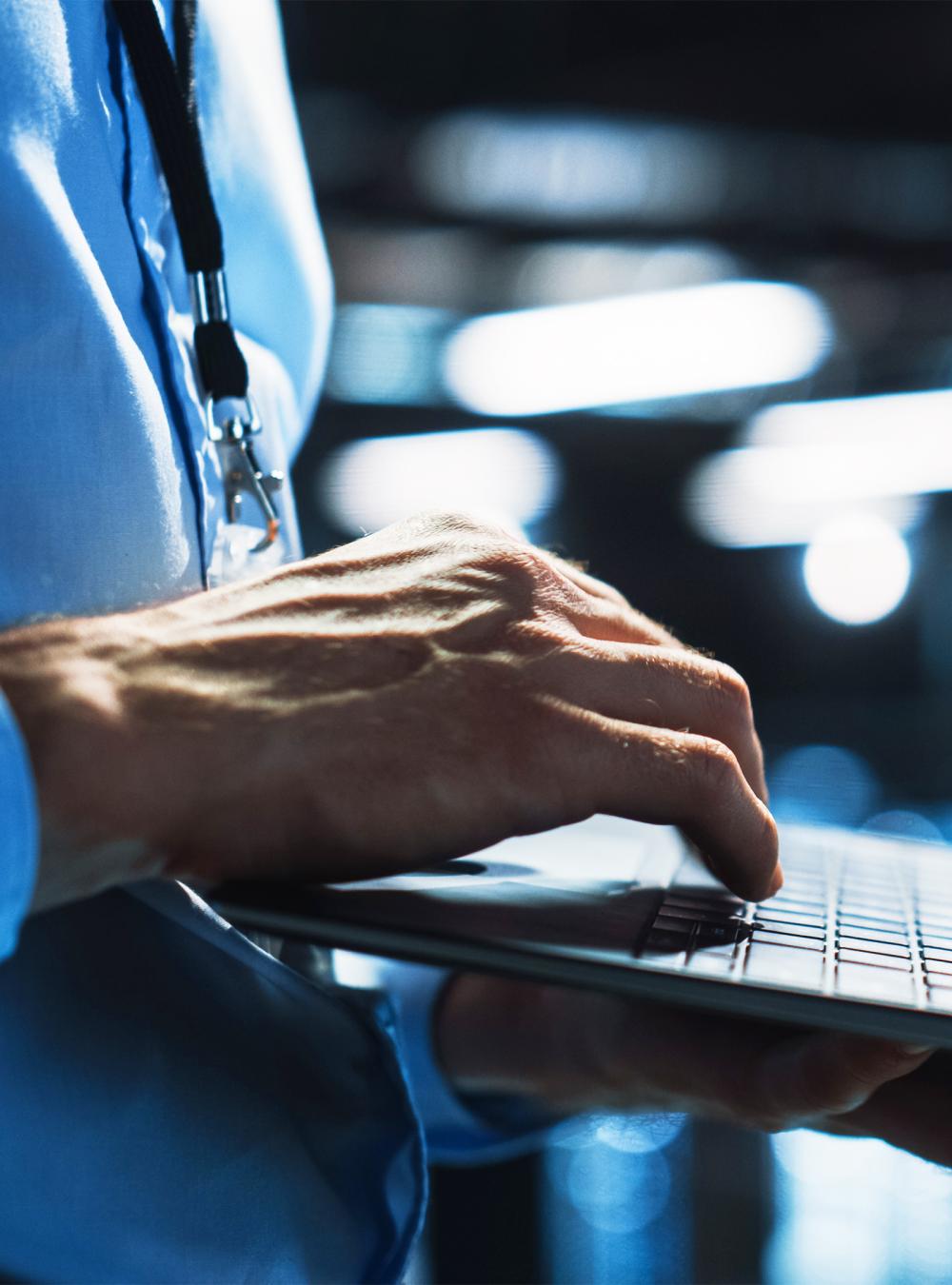 Network engineer working on a laptop