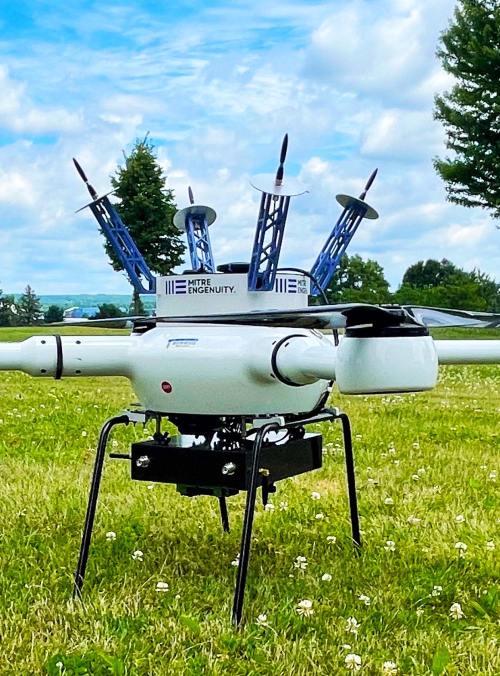 MITRE Engenuity drone in a field