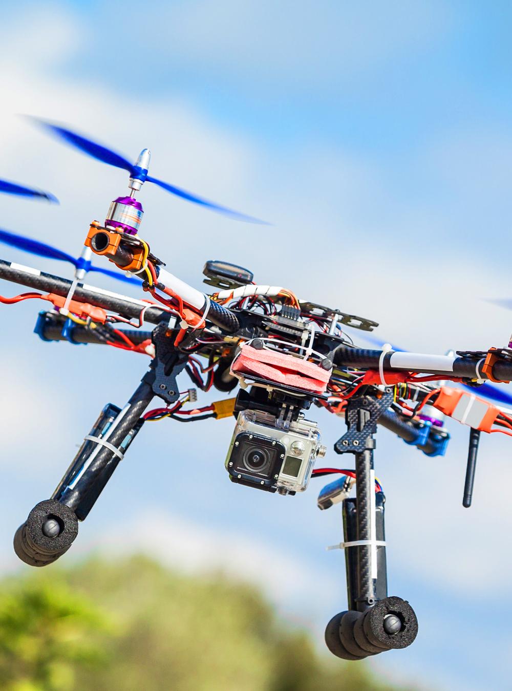 Professional carbon drone with GPS in flight