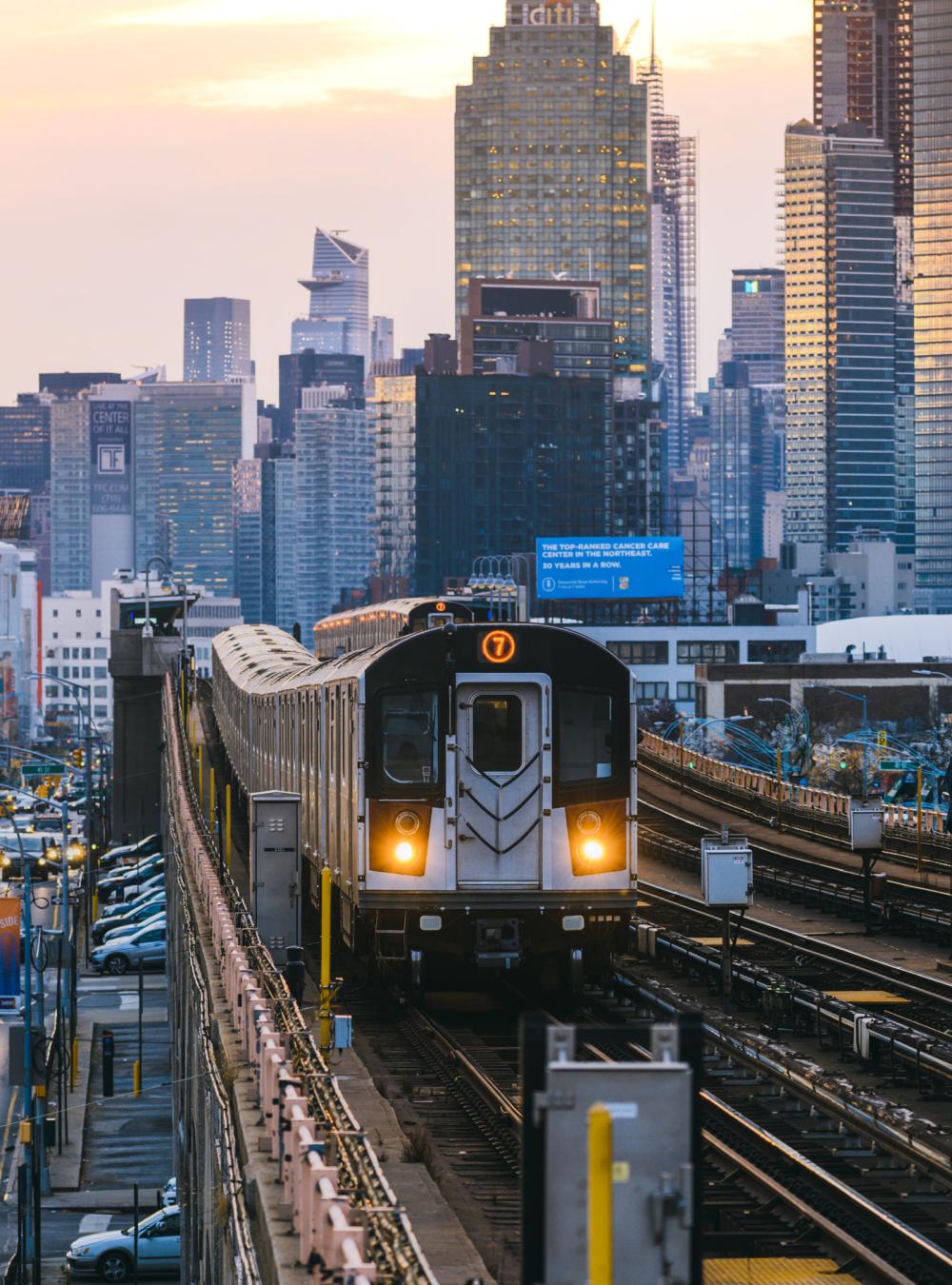 skyscrapers, highway and a train