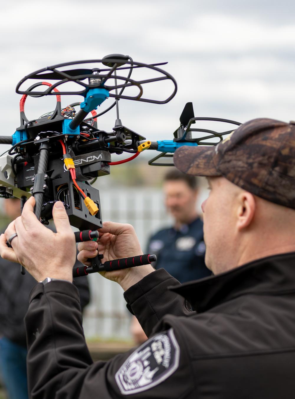 man holding a drone
