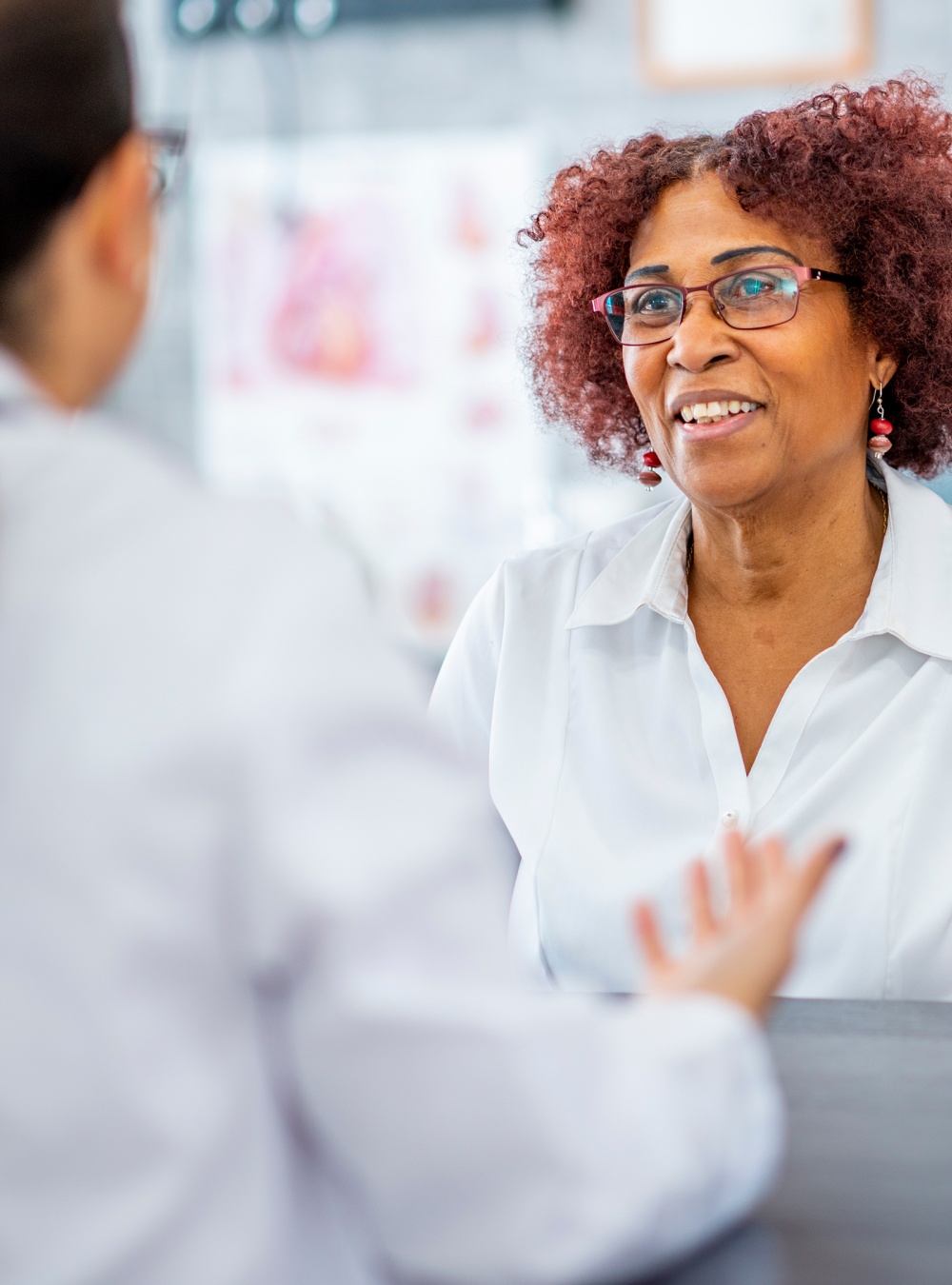 Woman speaking with a doctor