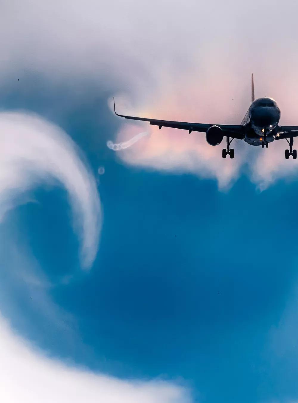 jet flying through clouds