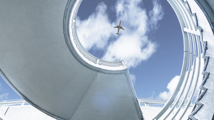 Jet flying above a spiral staircase