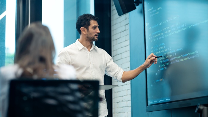 Man presents development code