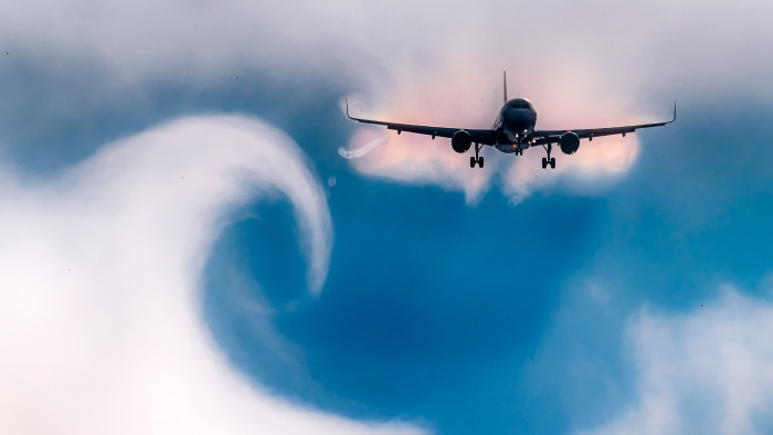 jet flying through clouds