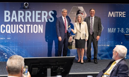 A golden sledgehammer given to Sen. Joni Ernst (R-Iowa) by MITRE’s vice president of national security, Keoki Jackson