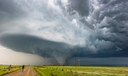Storm Chasers Photographing A Tornado