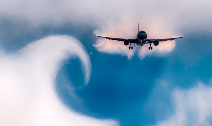 jet flying through clouds