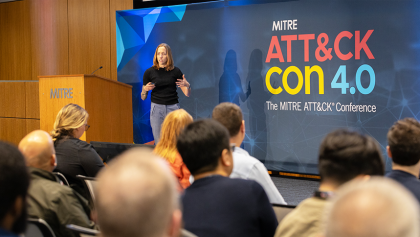 Presenter on stage during ATTACKcon 4.0